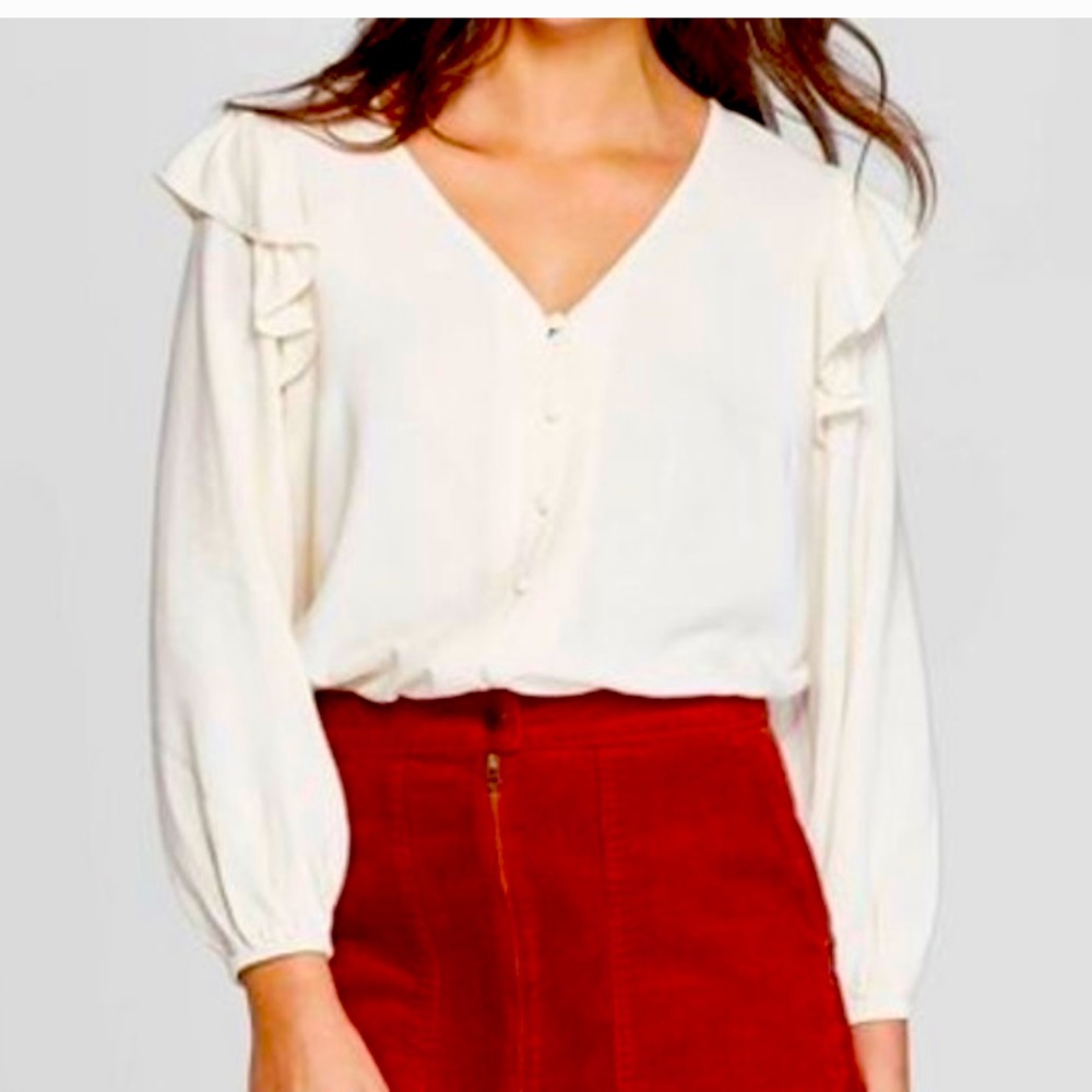 White ruffle long sleeve shirt
